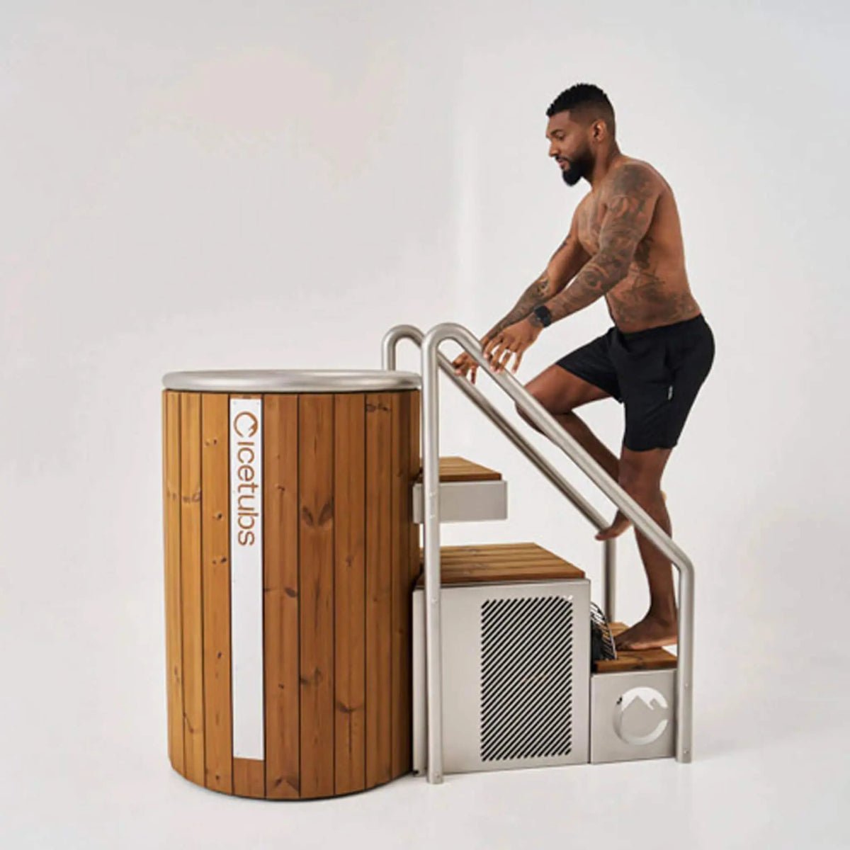 2026/08/icetubs-icebarrel-cold-plunge-tub-man-entering-with-stairs.jpg